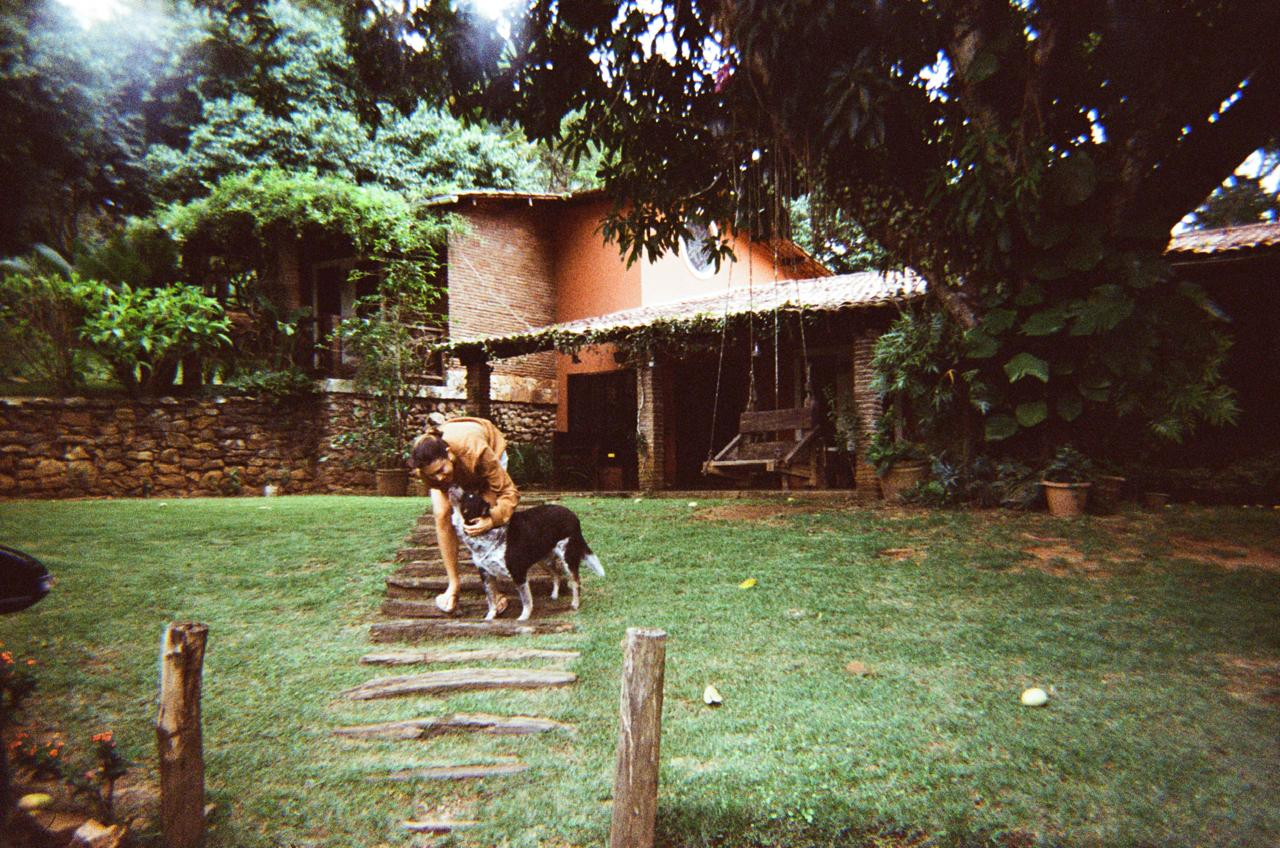 My wife greeting Chico in the garden of my grandmother's house
